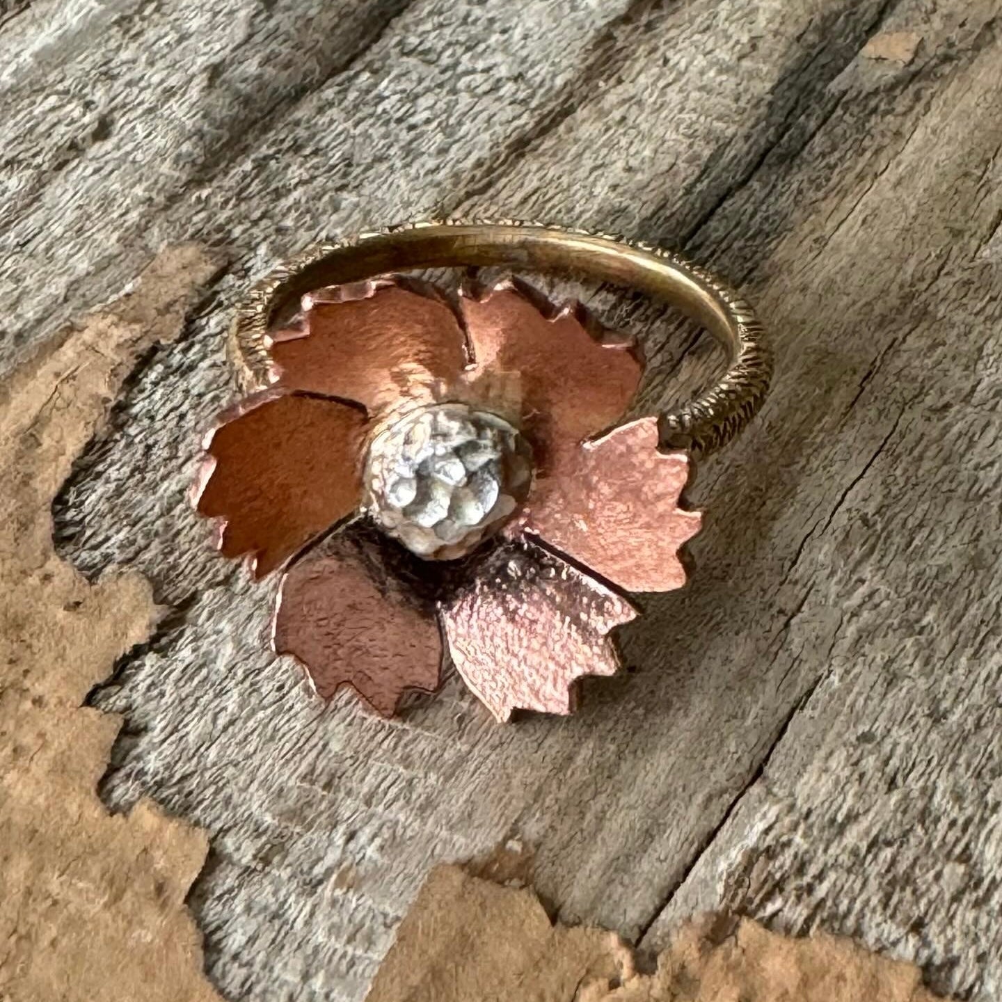 Artisan floral ring in copper, sterling silver, and brass from The Floret Collection, handmade in California