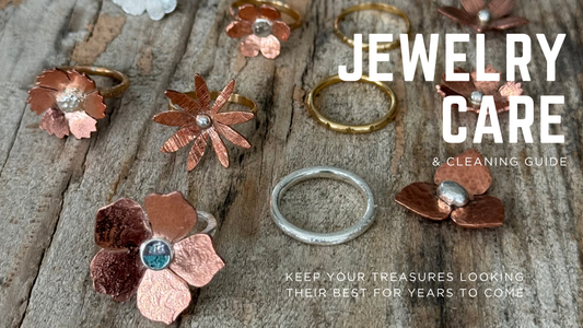 A collection of handcrafted rings by Narrow-Gauge Designs beneath the title 'Jewelry Care Guide'