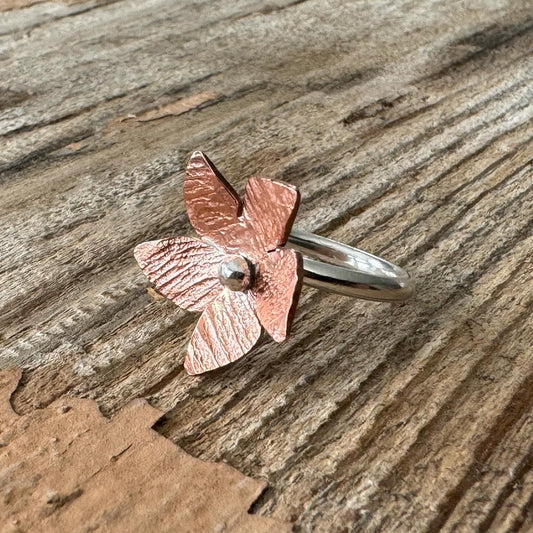 Lilian floret ring with copper and sterling silver flower on silver band, handmade artisan jewelry