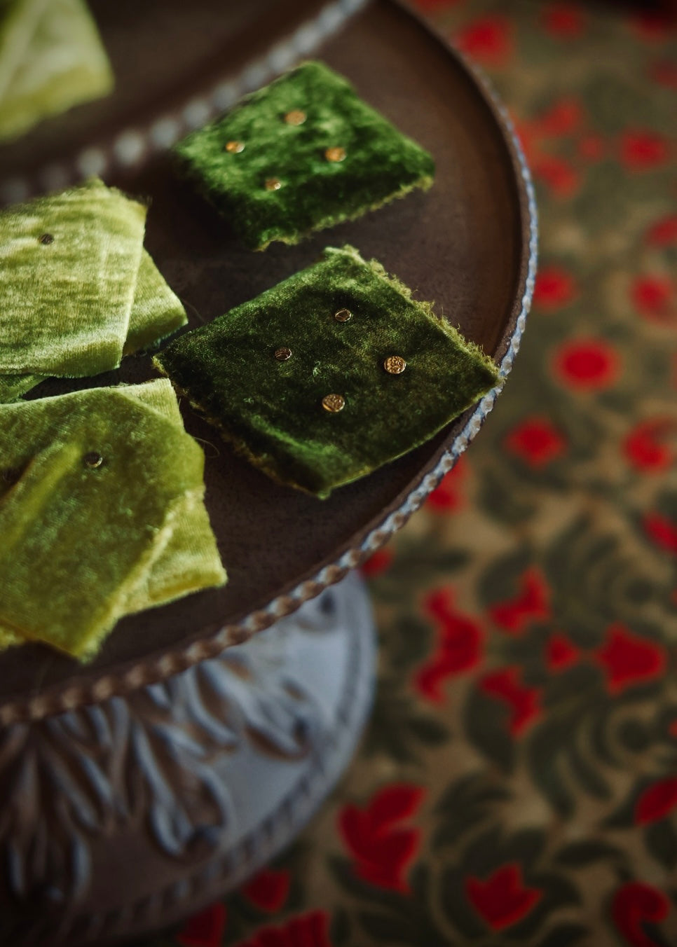 Victorian inspired brass stud earrings displayed on velvet cards.